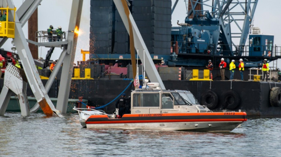 First vessel passes channel opened to aid Baltimore bridge cleanup