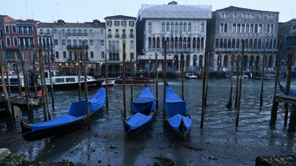 Venice gondolas beached by low tides