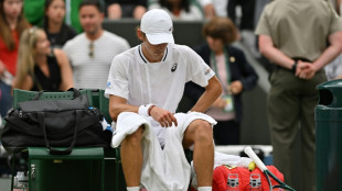 Djokovic into Wimbledon semi-finals as 'devastated' De Minaur pulls out