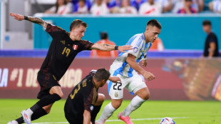 No Messi, no problem as Argentina down Peru; Canada advance